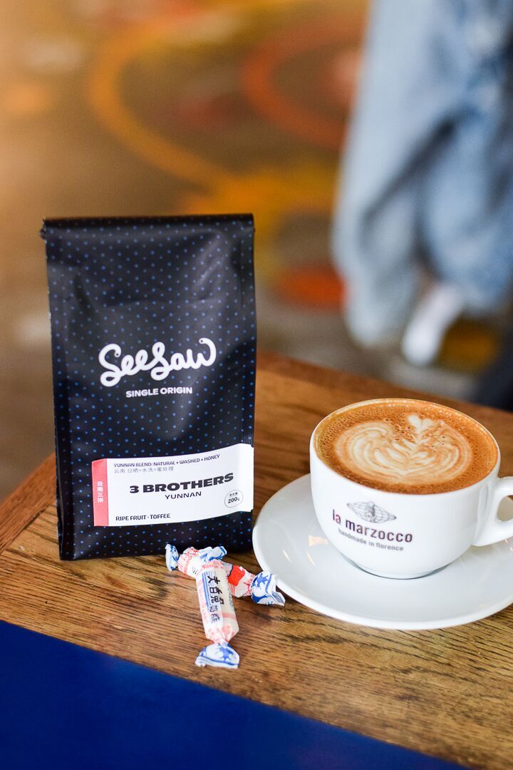 seesaw"s 3 brothers coffee packaging with a latte in a la